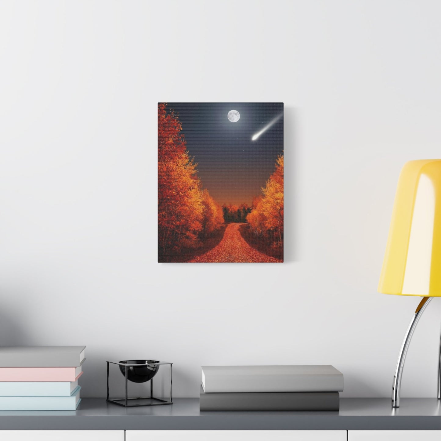 Canvas wall art depicting an autumn forest road under a moonlit sky with fall foliage and a shooting star