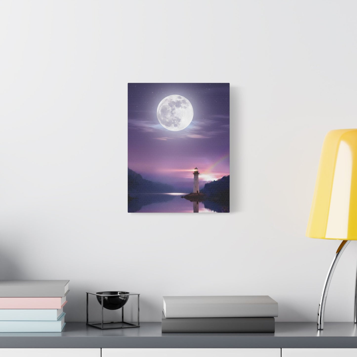Canvas wall art with a full moon over a lighthouse reflecting on a calm lake in violet and indigo tones