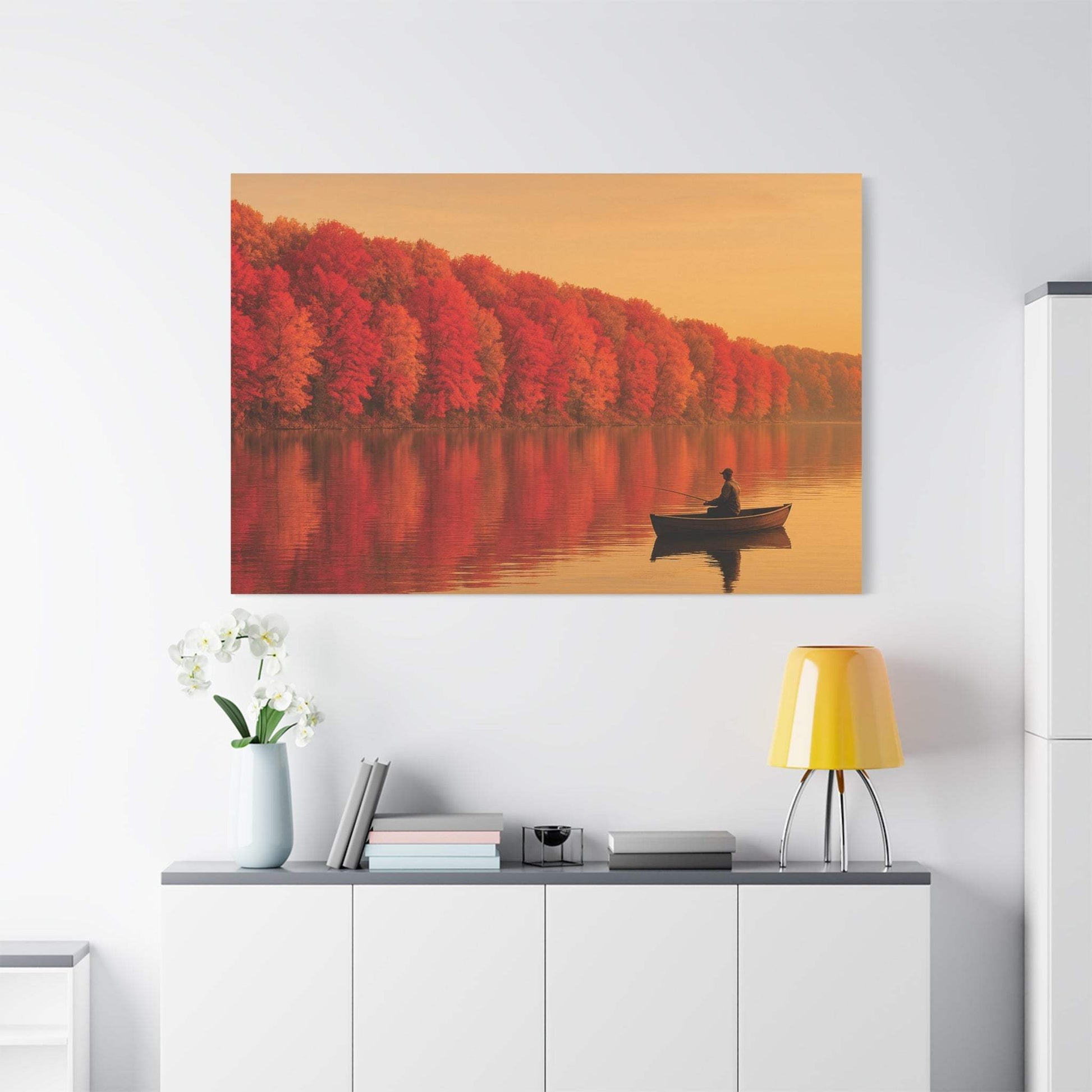 Wall art canvas of autumn foliage and fishing on a clear lake in warm orange tones