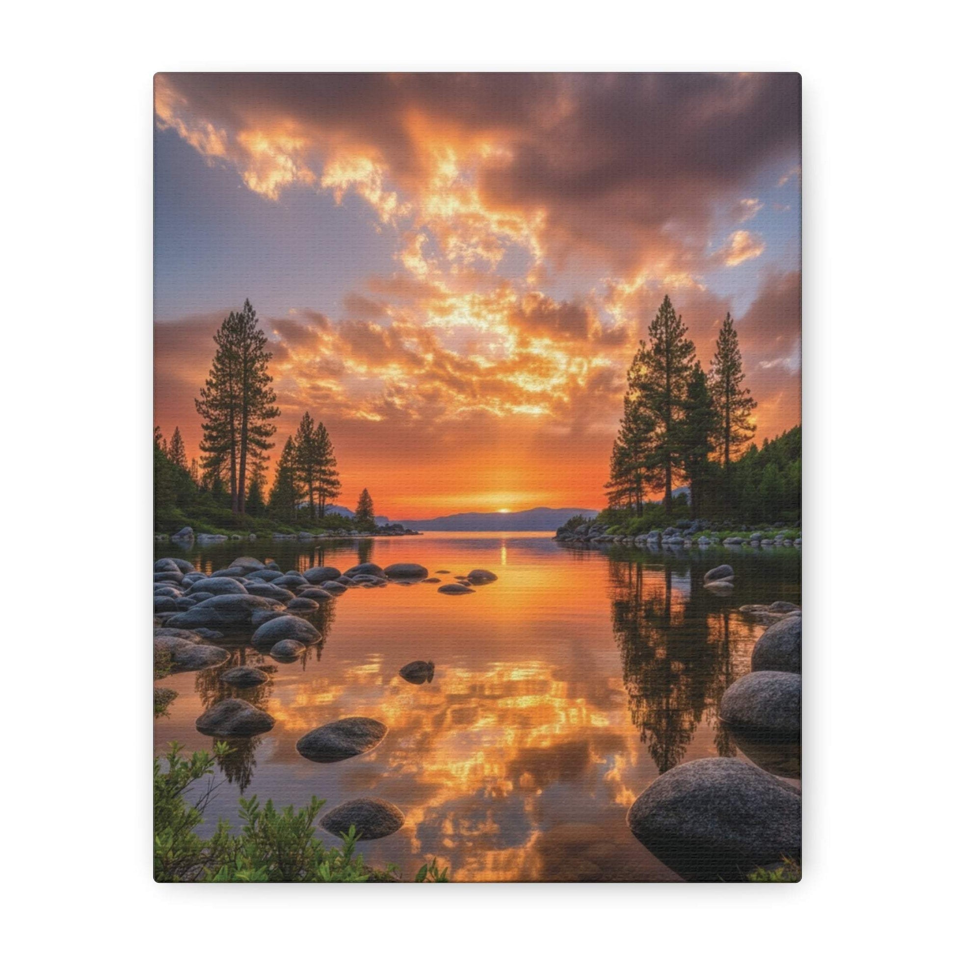 Canvas wall art of sunrise reflecting on a tranquil lake with pine trees and rocks along the shore.