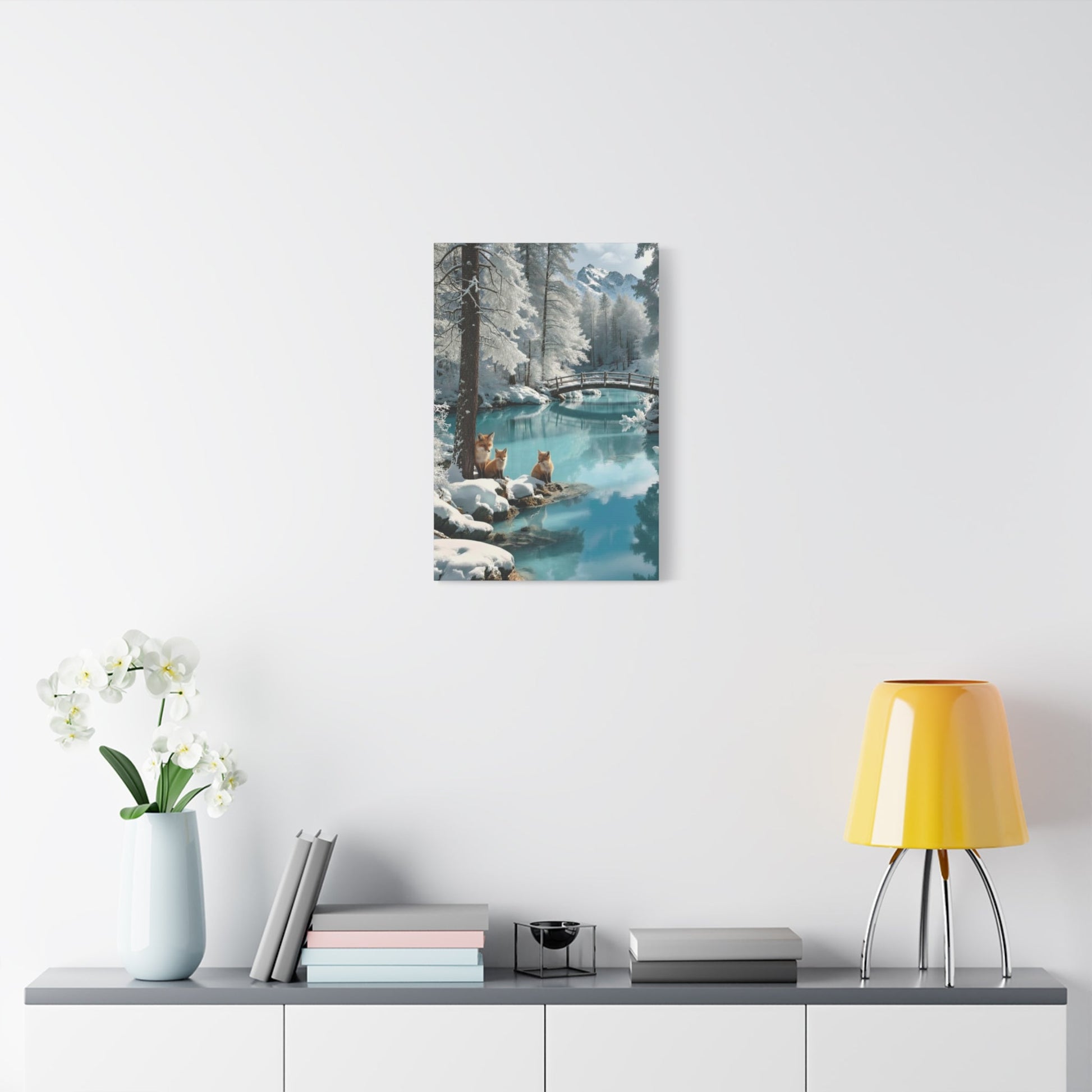 Canvas wall art depicting winter foxes by a serene snowy river with a bridge, perfect for cozy home decor.