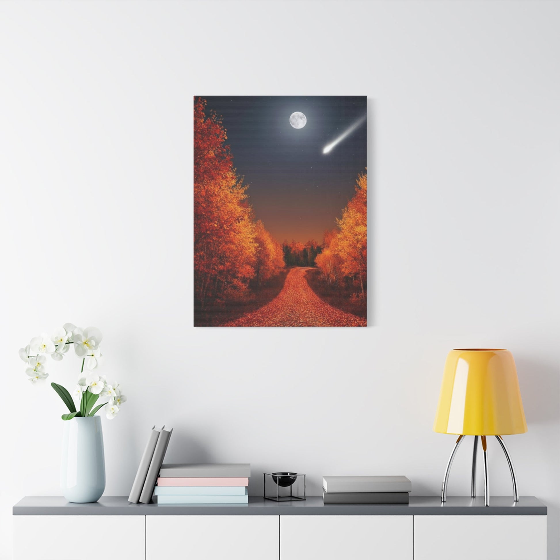 Canvas wall art depicting an autumn forest road under a moonlit sky with a shooting star and colorful fall trees