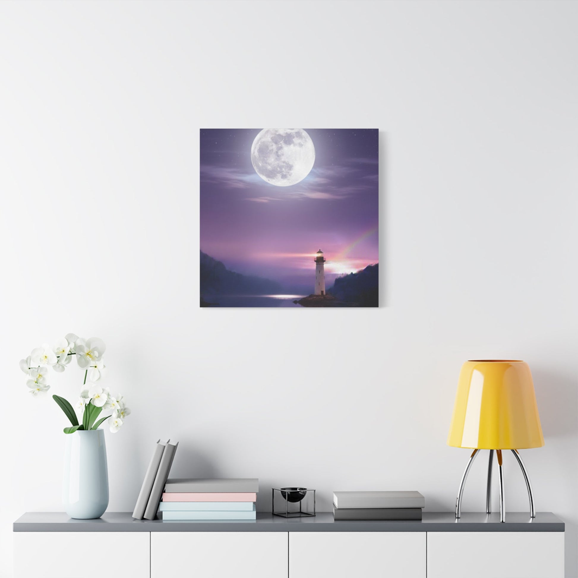 Canvas wall art featuring a serene lighthouse under a full moon with violet and indigo tones reflecting on a calm lake