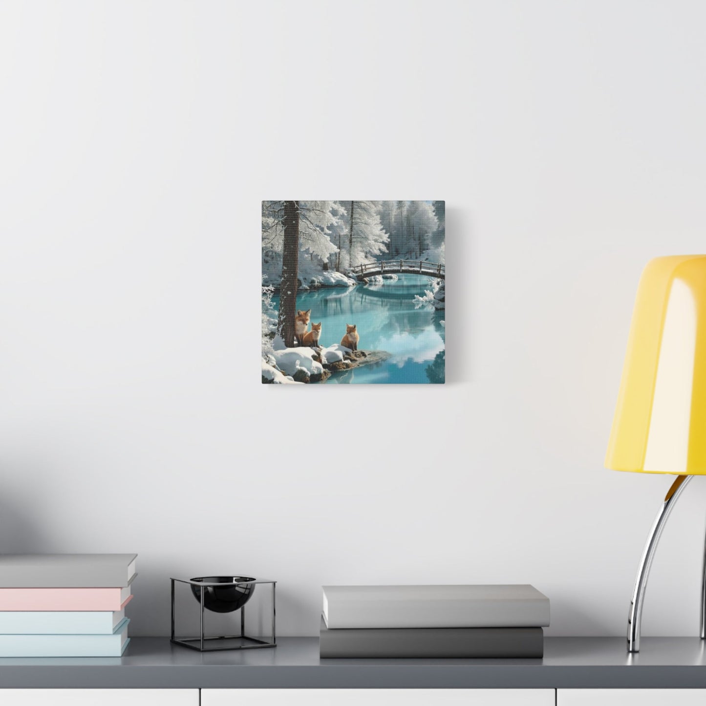 Winter foxes on serene snowy landscape canvas wall art in modern room setting