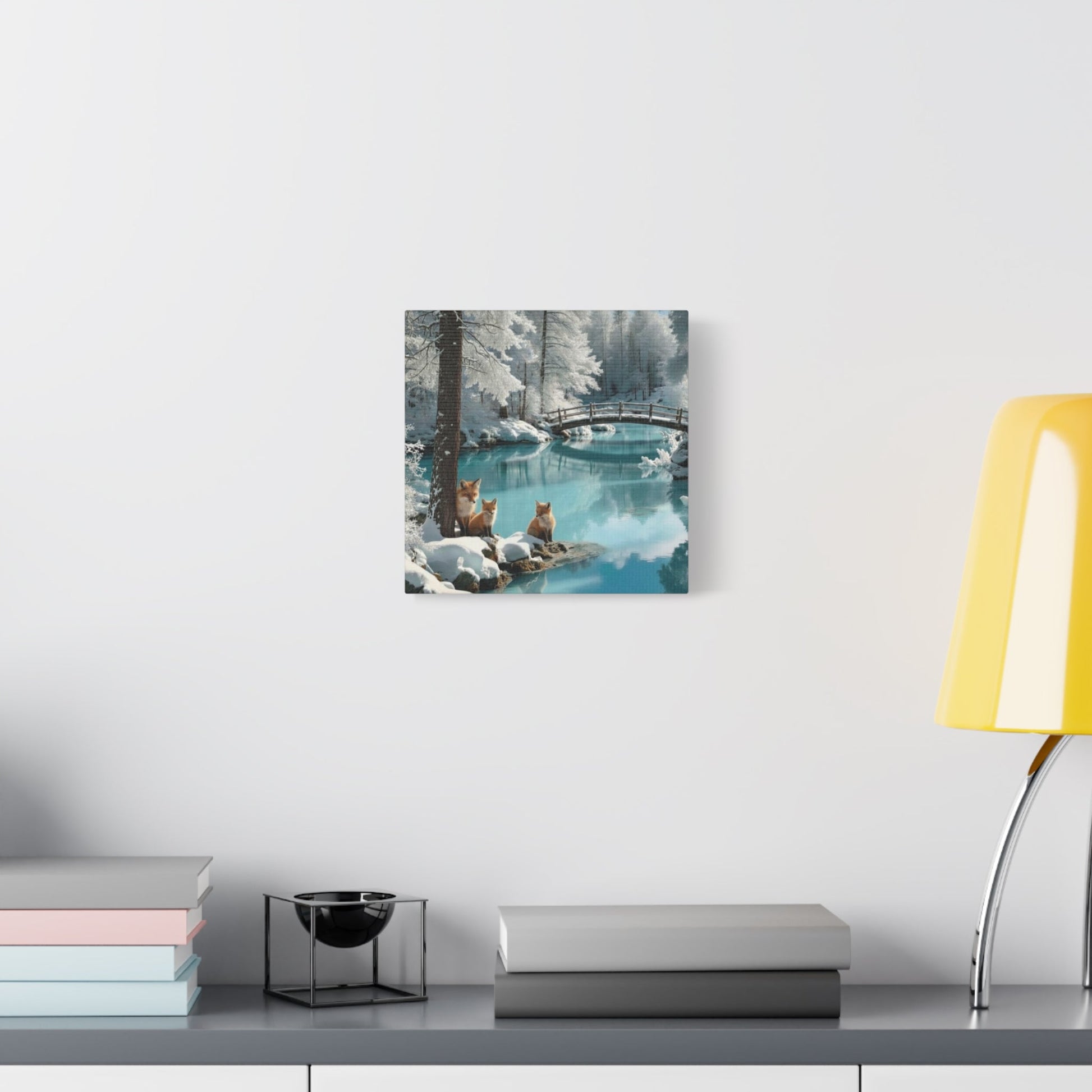 Winter foxes on serene snowy landscape canvas wall art in modern room setting