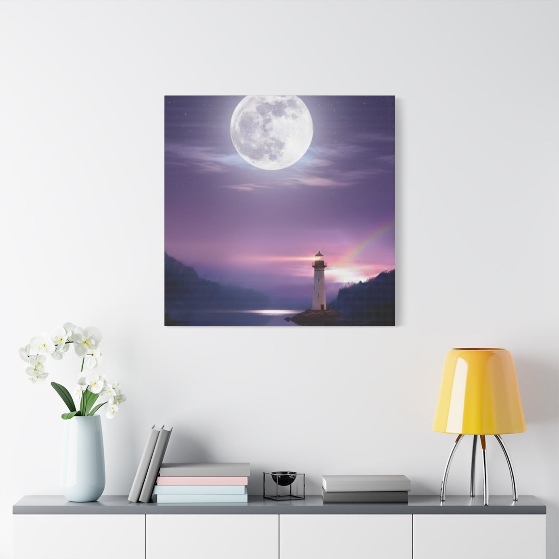 Canvas wall art of a lighthouse under a full moon reflecting on a calm lake in violet and indigo tones