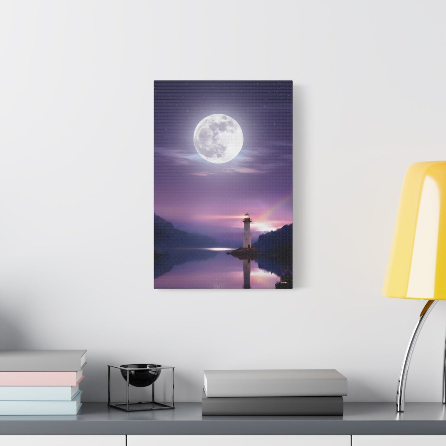 Canvas wall art depicting a lighthouse by a mirror-smooth lake under a glowing full moon in serene violet and indigo tones.