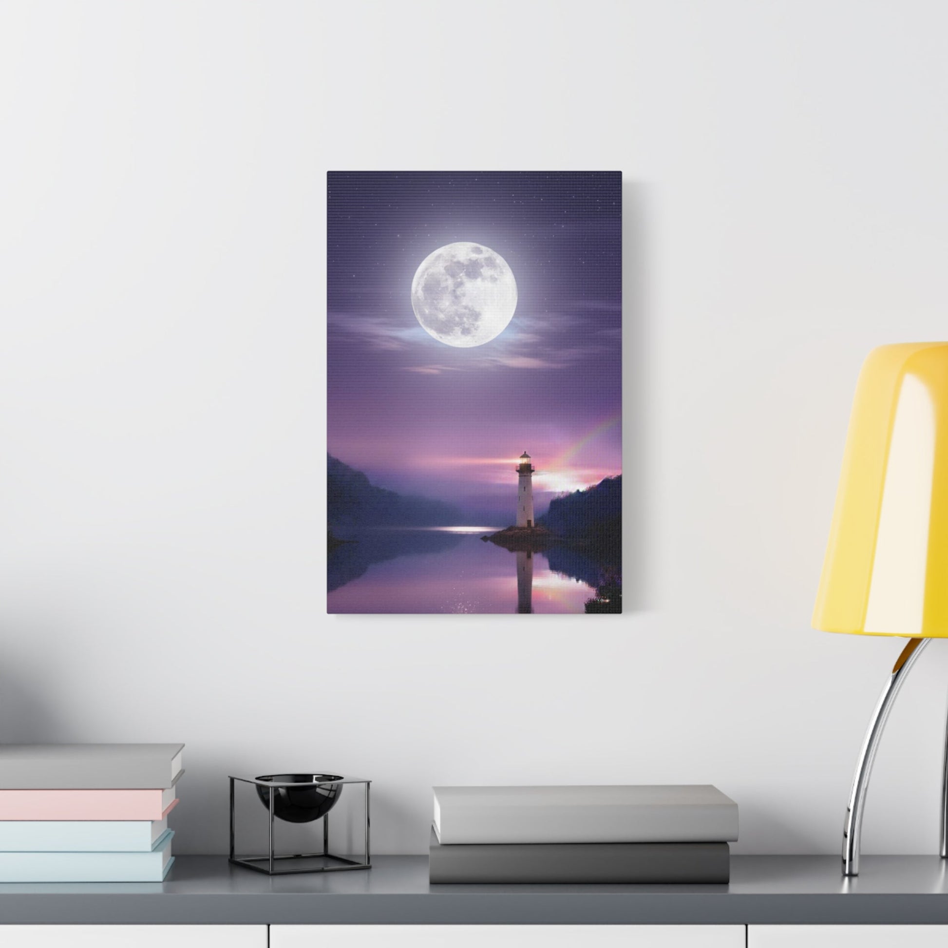 Canvas wall art depicting a lighthouse by a mirror-smooth lake under a glowing full moon in serene violet and indigo tones.