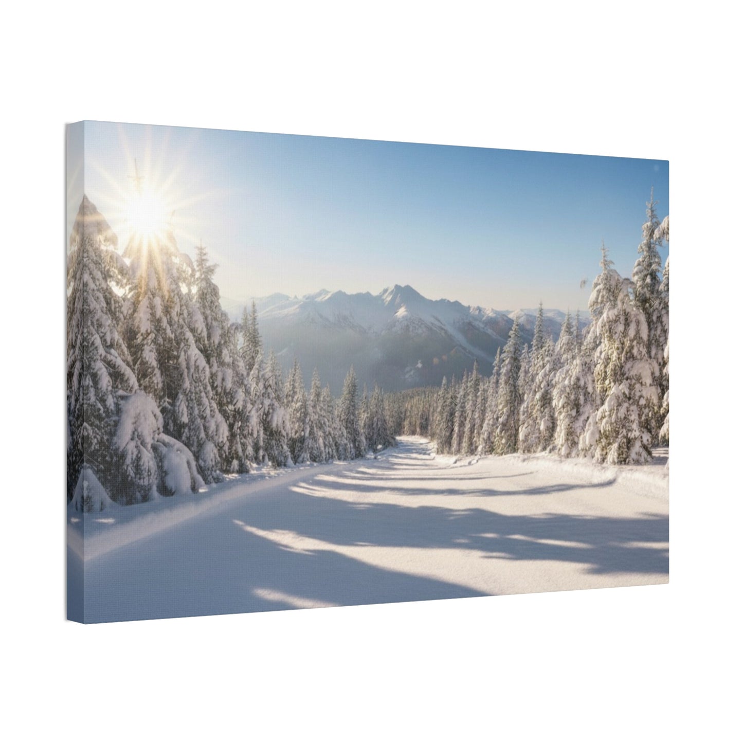 Canvas wall art of a serene winter trail with snow-covered trees, mountains, and morning sunlight