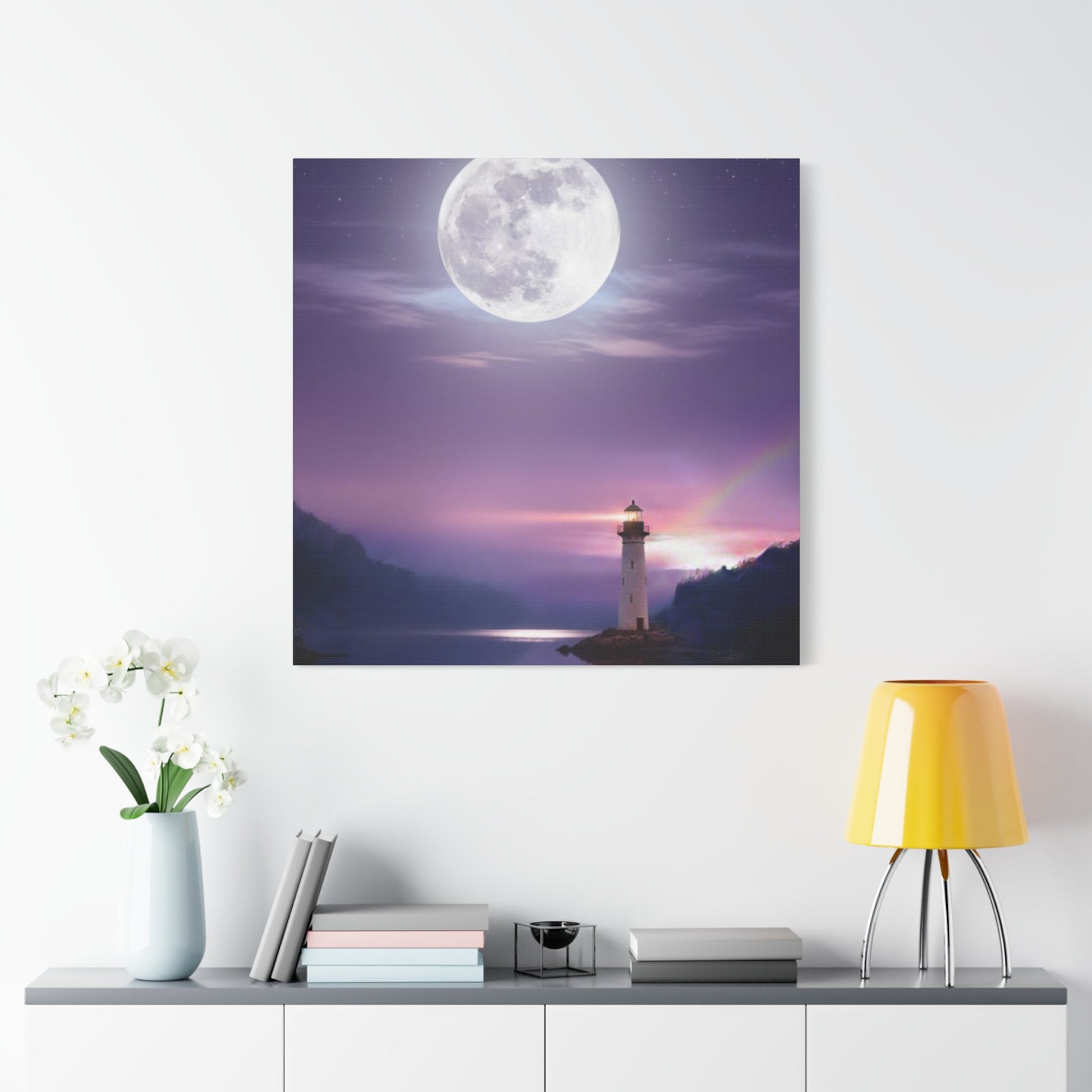 Canvas wall art featuring a serene full moon over a lighthouse and calm lake in violet and indigo tones