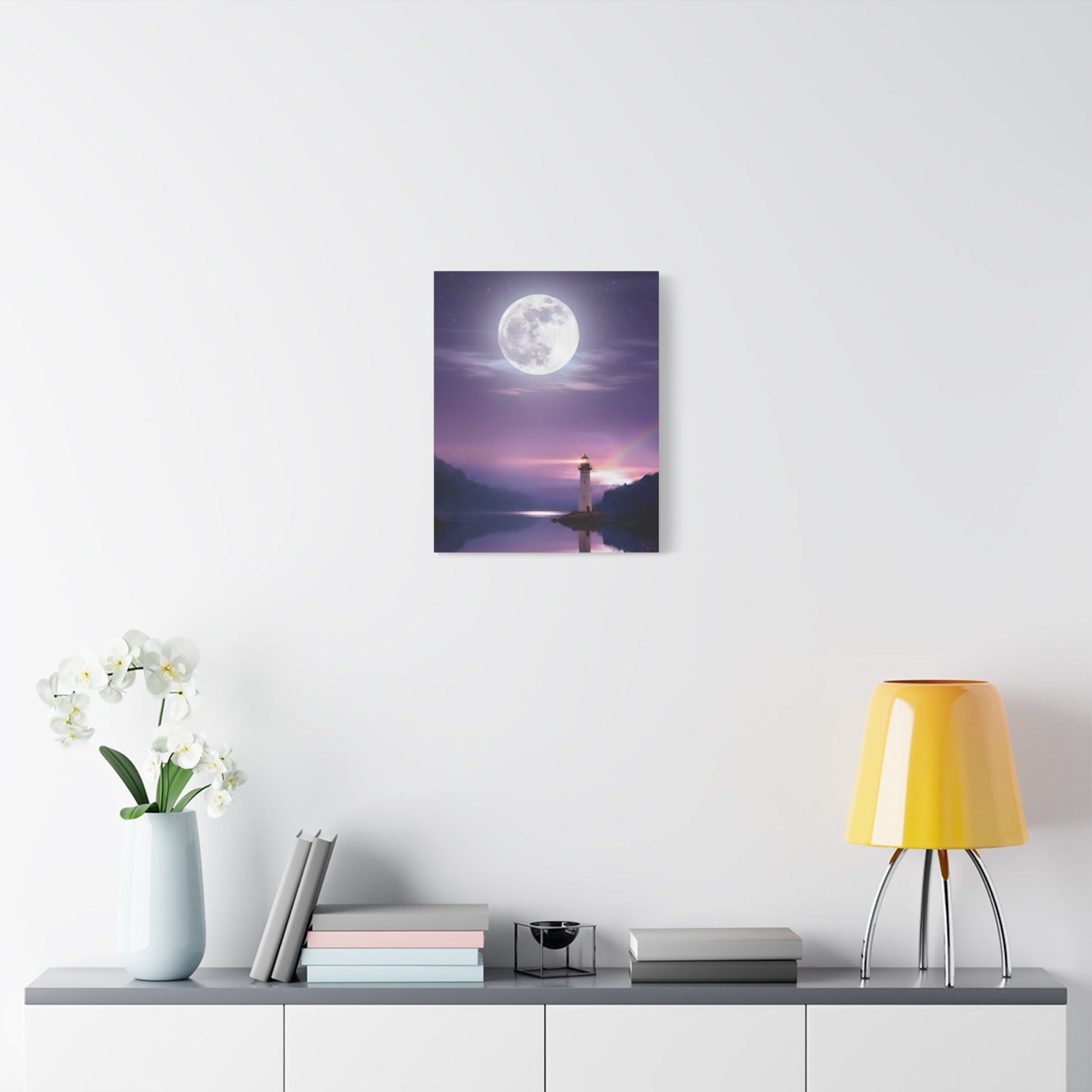 Canvas wall art featuring a full moon over a calm lake with a lighthouse reflected in violet and indigo tones