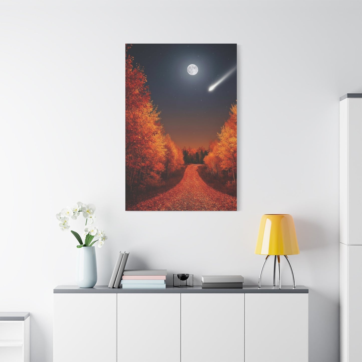 Canvas wall art depicting an autumn forest road under a quiet moon with fall foliage and a shooting star