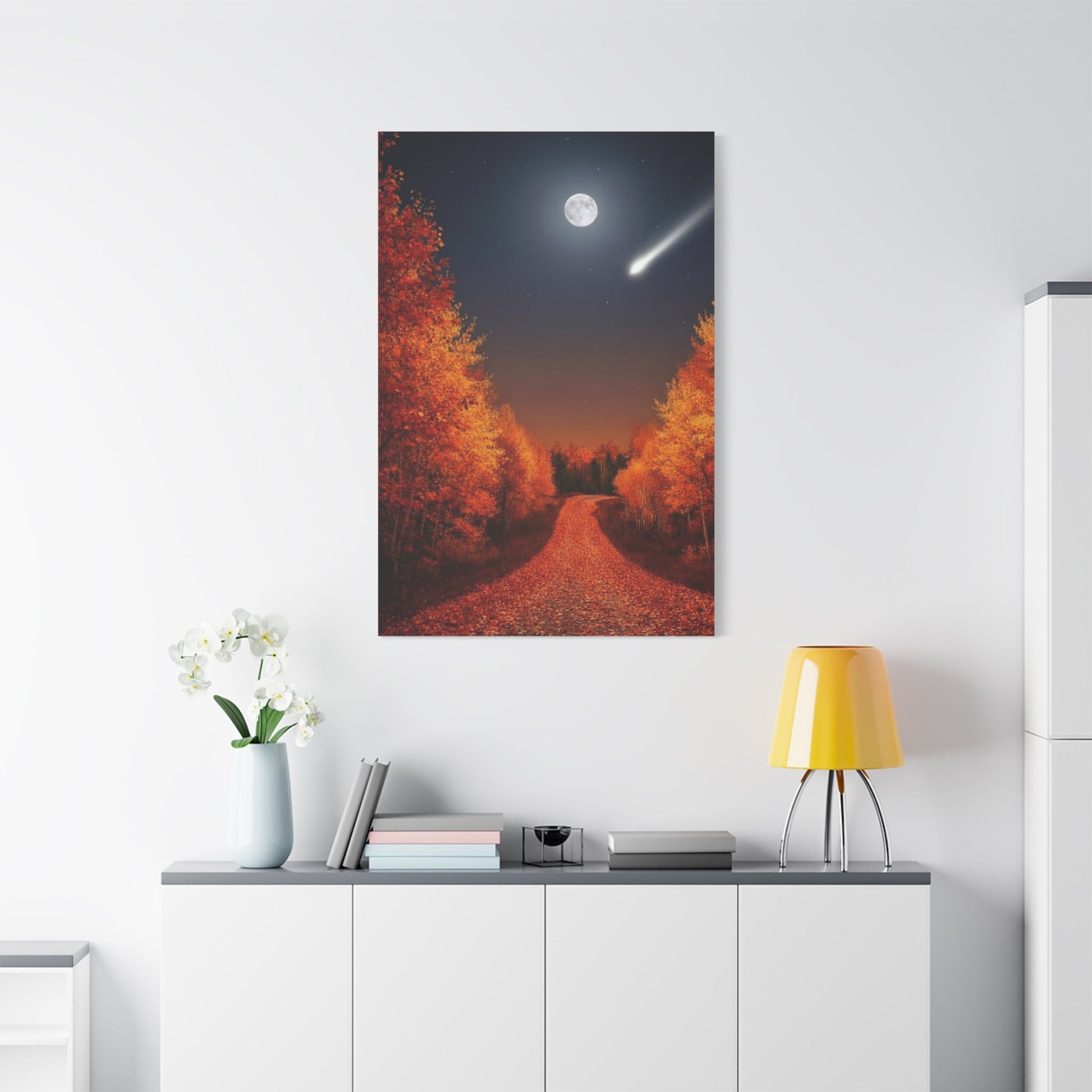 Canvas wall art depicting an autumn forest road under a quiet moon with fall foliage and a shooting star