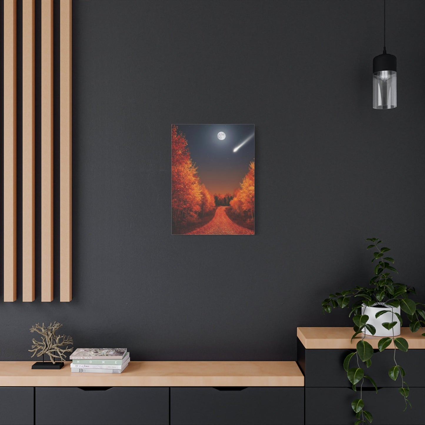 Canvas wall art depicting a quiet autumn forest road under a full moon with warm fall foliage and a shooting star on a dark wall